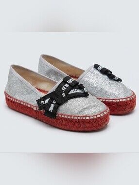 Moschino Silver Glitter Espadrilles with Black Logo Bow and Red Woven‎ Sole